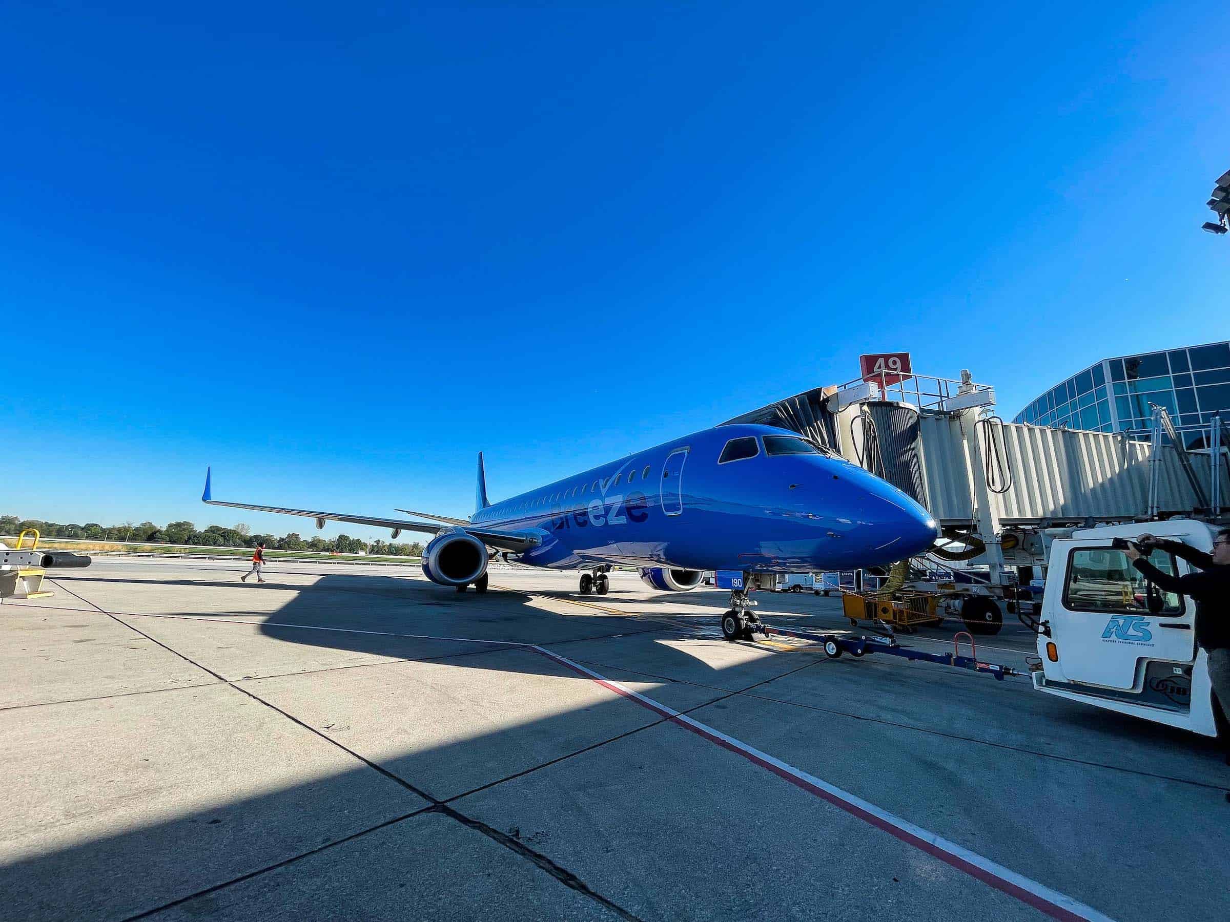 Breeze Airways sits at gate C49 prior to departure from CMH Airport.
