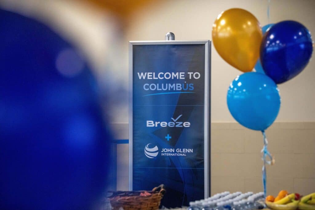 Breeze inaugural launch at CMH, close up of balloons and Welcome to Columbus event sign.