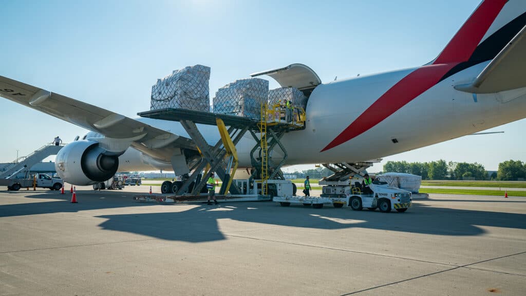 A cargo plane is loaded with boxes at CMH Airport.