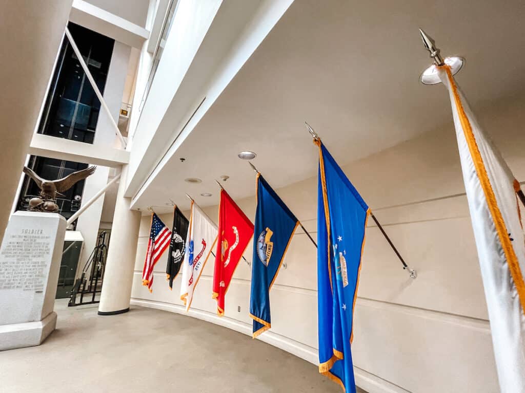 A group of flags hanging on a wall in John Glenn International, Columbus Regional Airport Authority (CMH Airport).