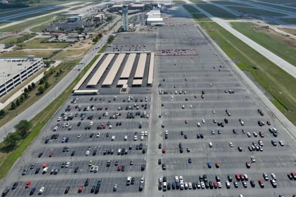 Aerial view of the Blue Lot, covered and uncovered, at John Glenn Columbus International Airport, on a sunny day.