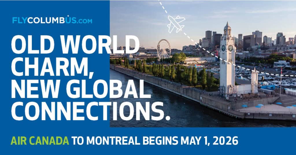 Advertisement for Air Canada featuring a cityscape with a clock tower and Ferris wheel, promoting new flights from Columbus to Montreal starting May 1, 2026. Website "FlyColumbus.com" is shown with the slogan "Old World Charm, New Global Connections."