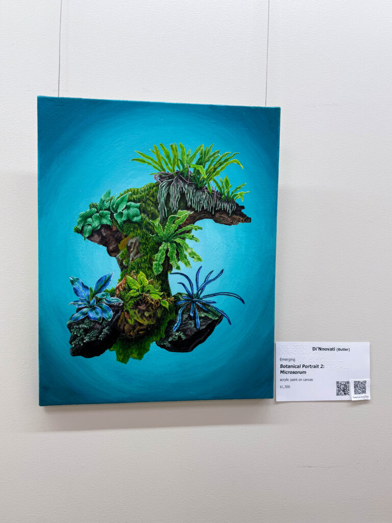 A bright painting titled Botanical Portrait 2: Microsorum by artist Di’Innovati, featuring lush green plants and blue flowers growing from a floating piece of earth against a turquoise background.