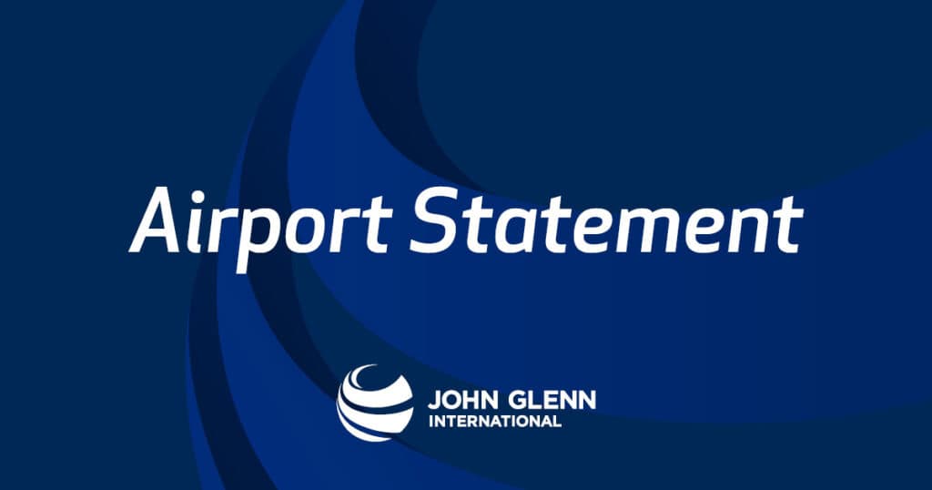 A dark blue graphic with transparent markings of a globe. The text on the image reads, "airport statement." With the John Glenn logo at the bottom.