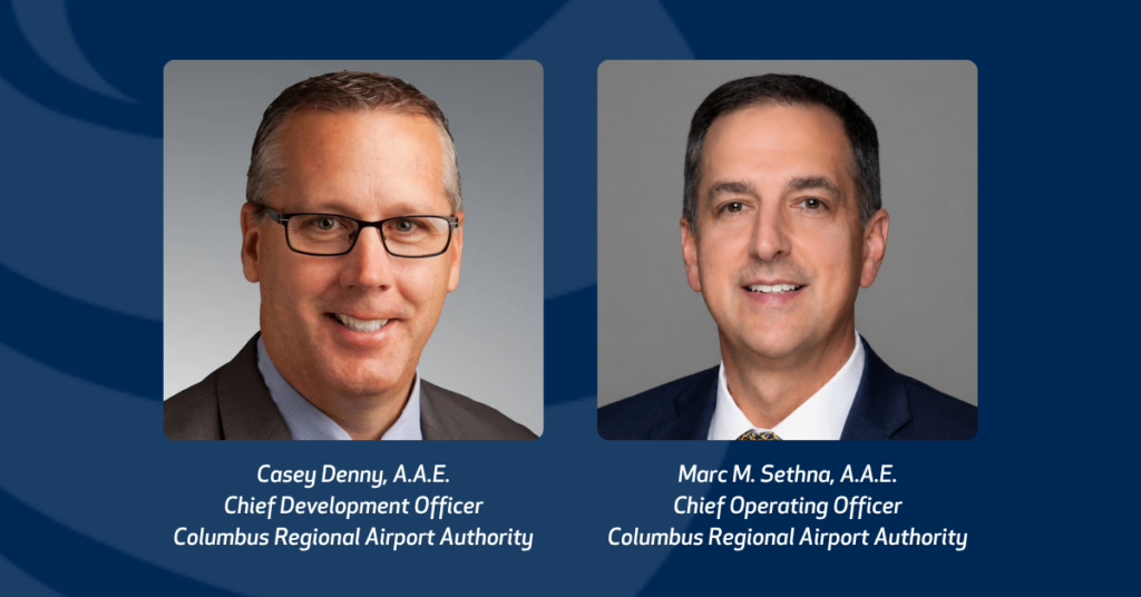 Two professional headshots side by side on a dark blue background. On the left, Casey Denny, A.A.E., Chief Development Officer, Columbus Regional Airport Authority — a man with short graying hair and black-framed glasses, wearing a dark suit jacket and light blue shirt, smiling. On the right, Marc M. Sethna, A.A.E., Chief Operating Officer, Columbus Regional Airport Authority — a man with short dark hair, wearing a navy suit, white shirt, and patterned tie, smiling. Each name and title appears in white italic text below the corresponding photo.